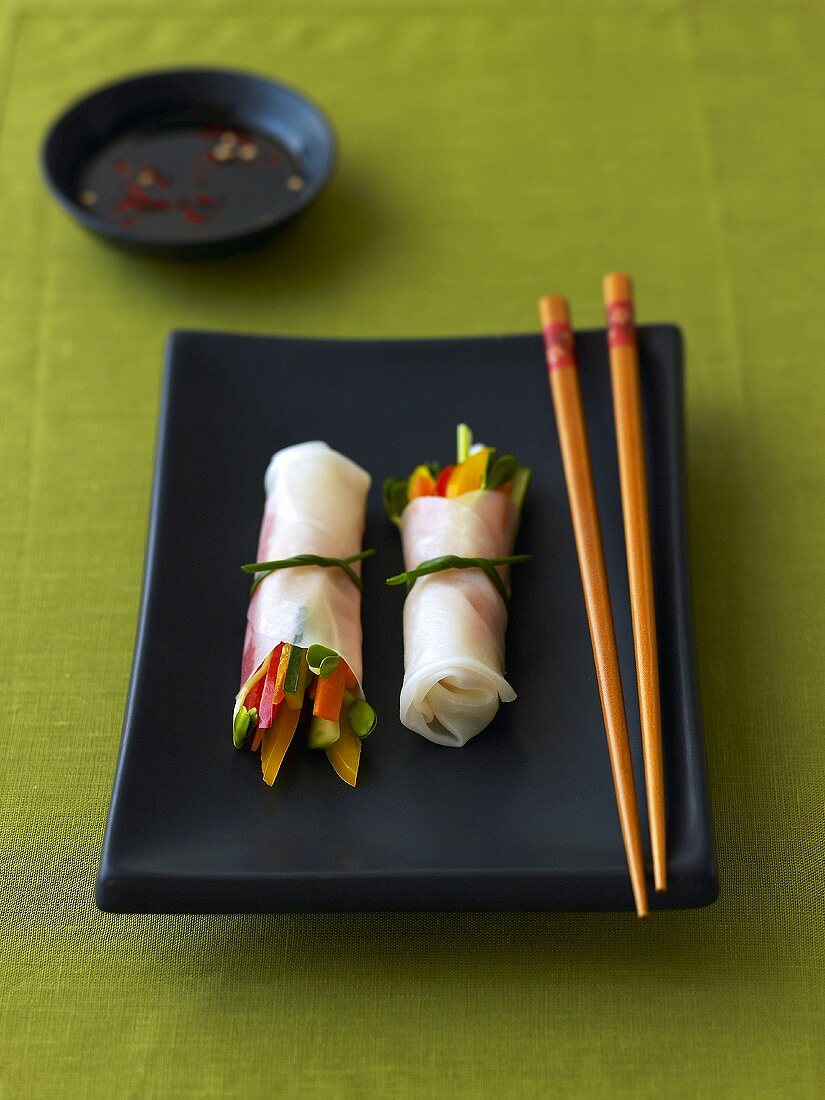 Rice paper rolls with vegetable filling and chili-soy dip