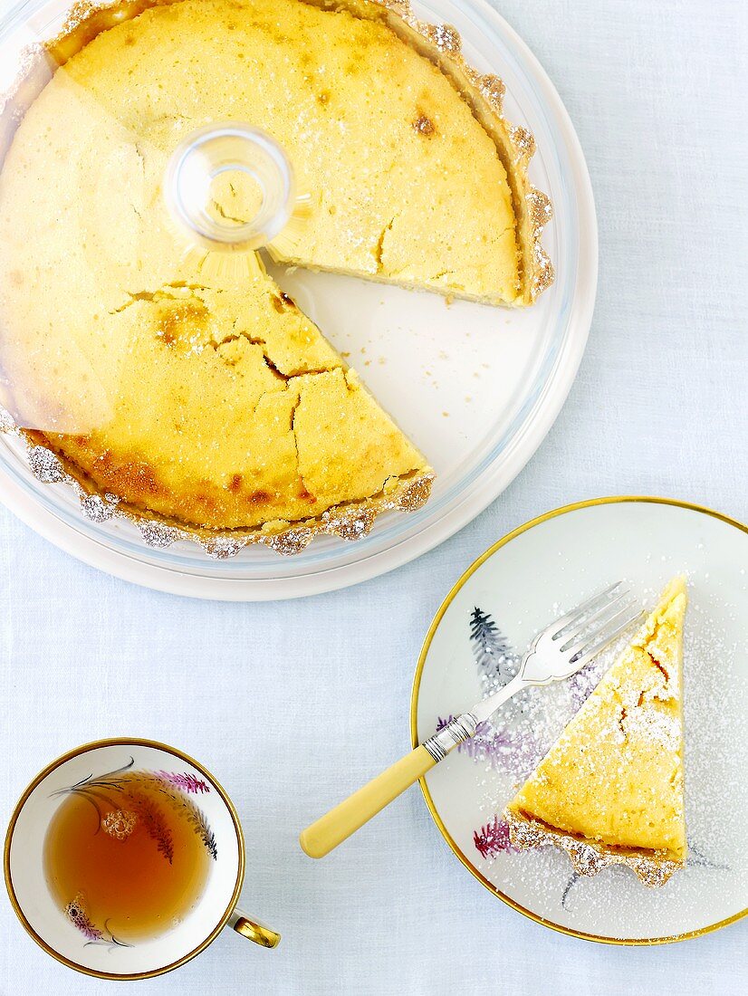 Lemon tart with a cup of tea