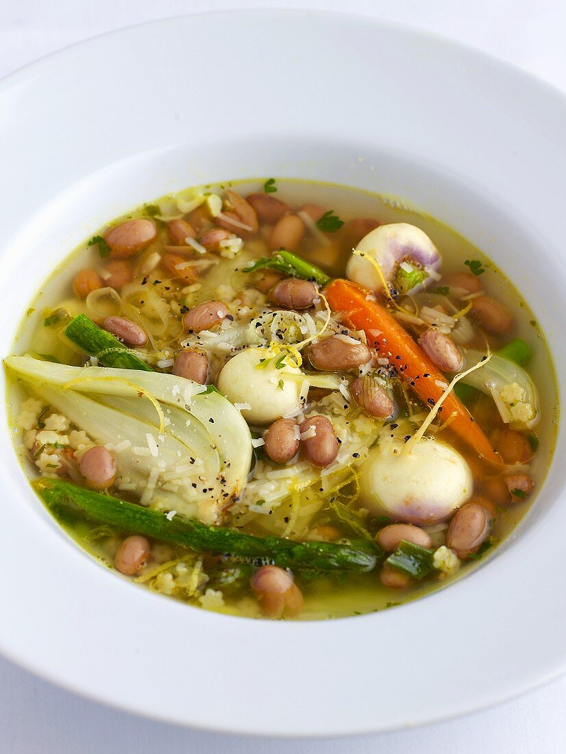 Winter vegetable soup with beans, turnips and Parmesan