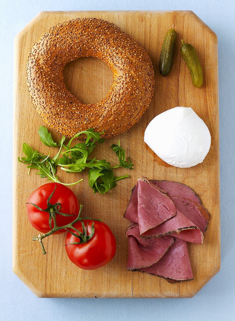 Ingredients for a bagel with pastrami