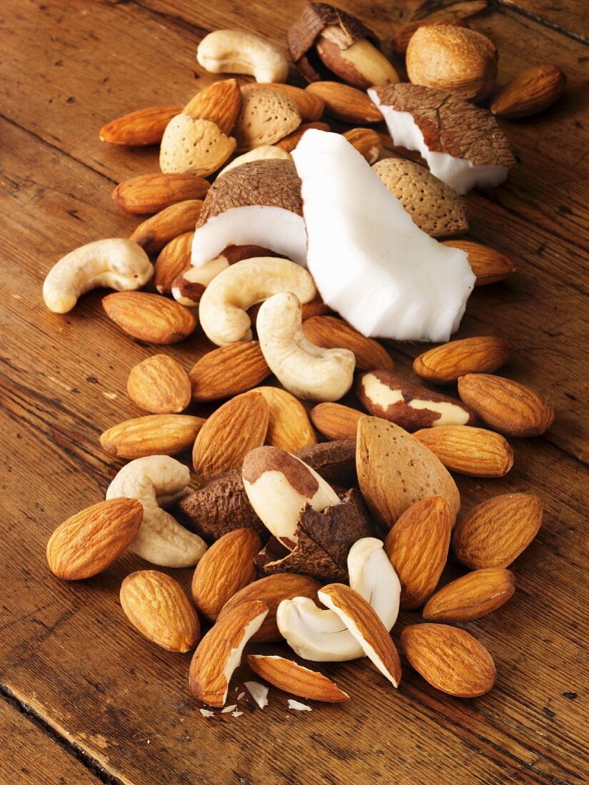 Assorted nuts on wooden background