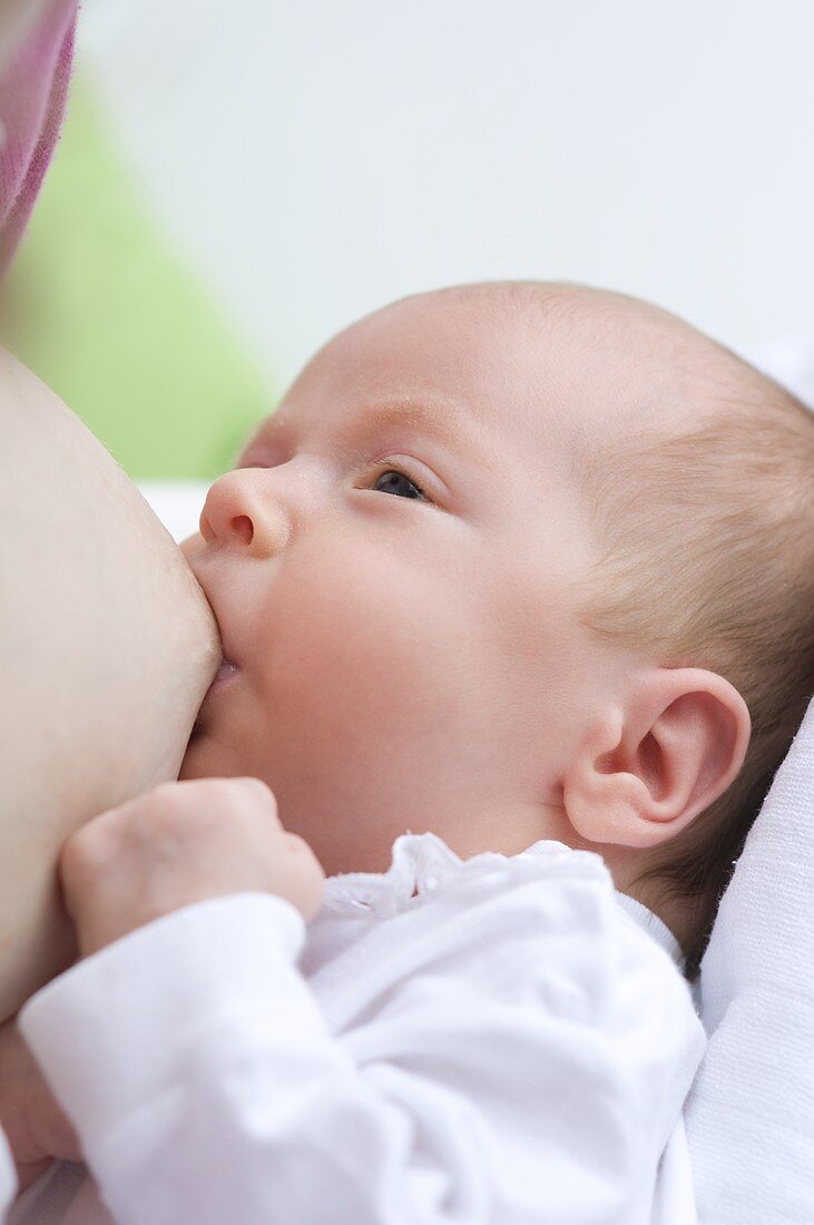 Mother breastfeeding her baby