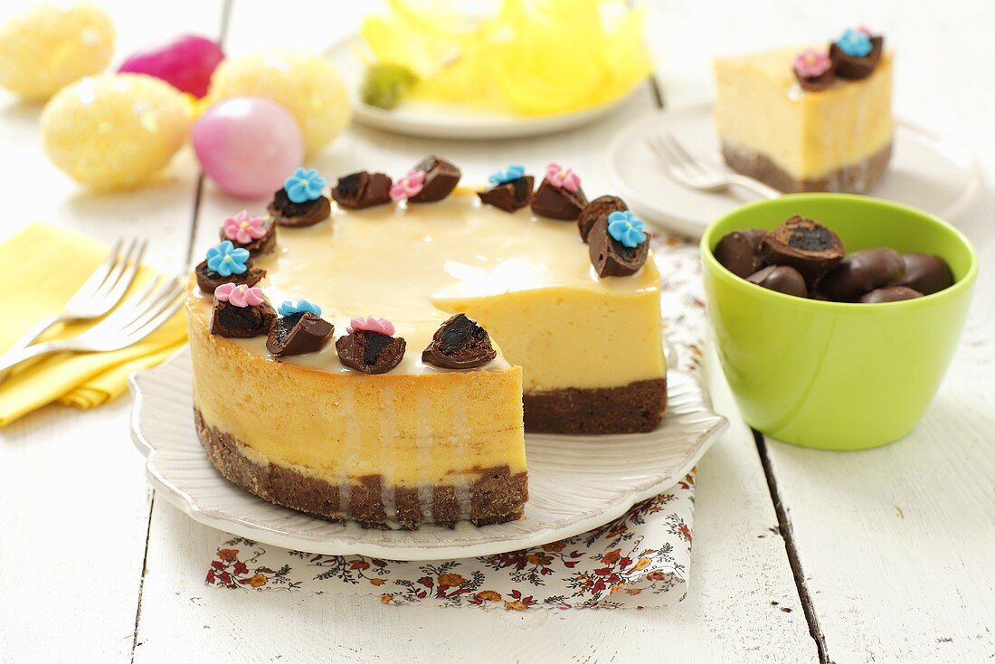 Cheese cake with chocolate-covered plums for Easter