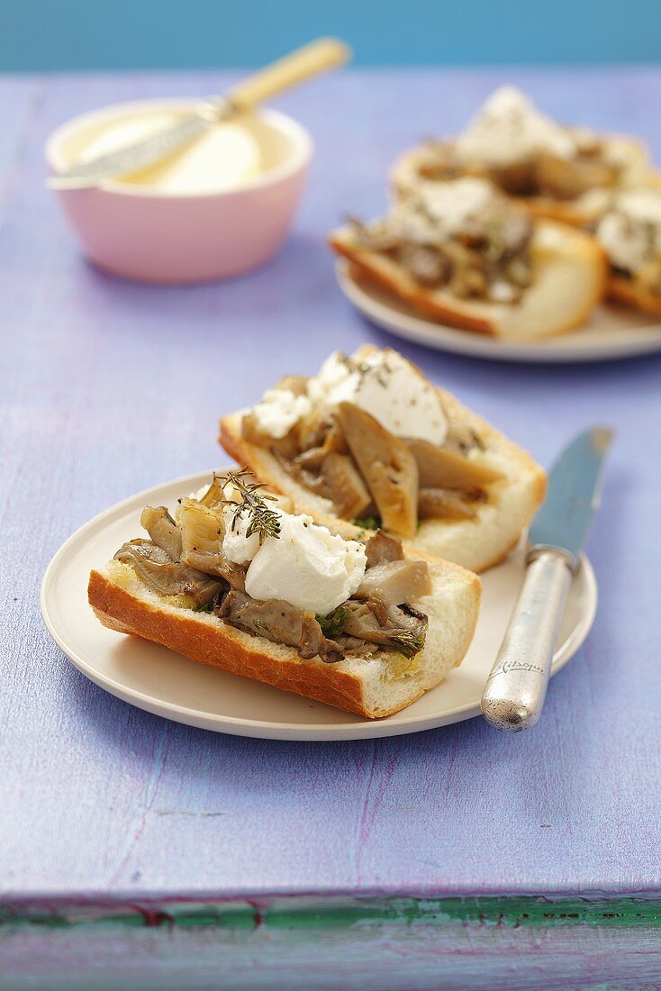 Baked baguette with oyster mushrooms and ricotta