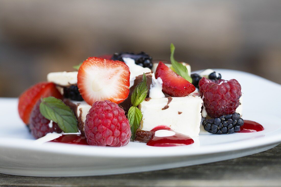 Kaiserschmarrn (shredded sugared pancake from Austria) with ice cream and berries