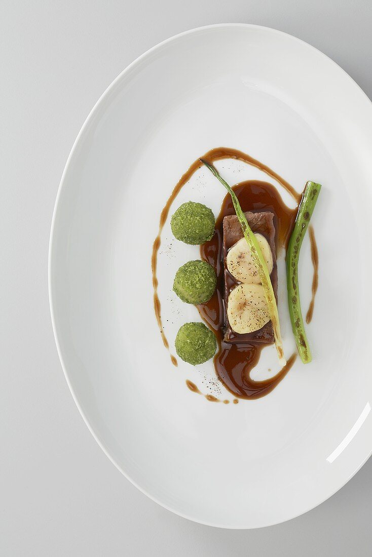 Braised shoulder of beef with burgundy sauce and bone marrow dumplings