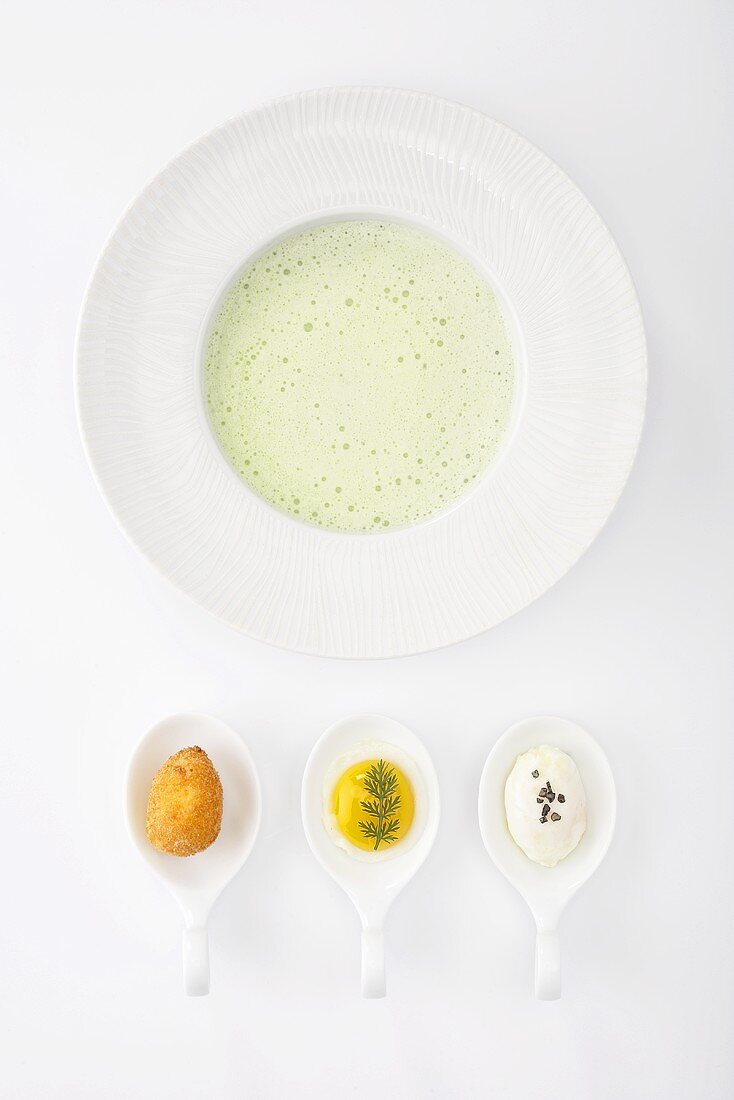 Cold cucumber soup with a trio of quail's eggs