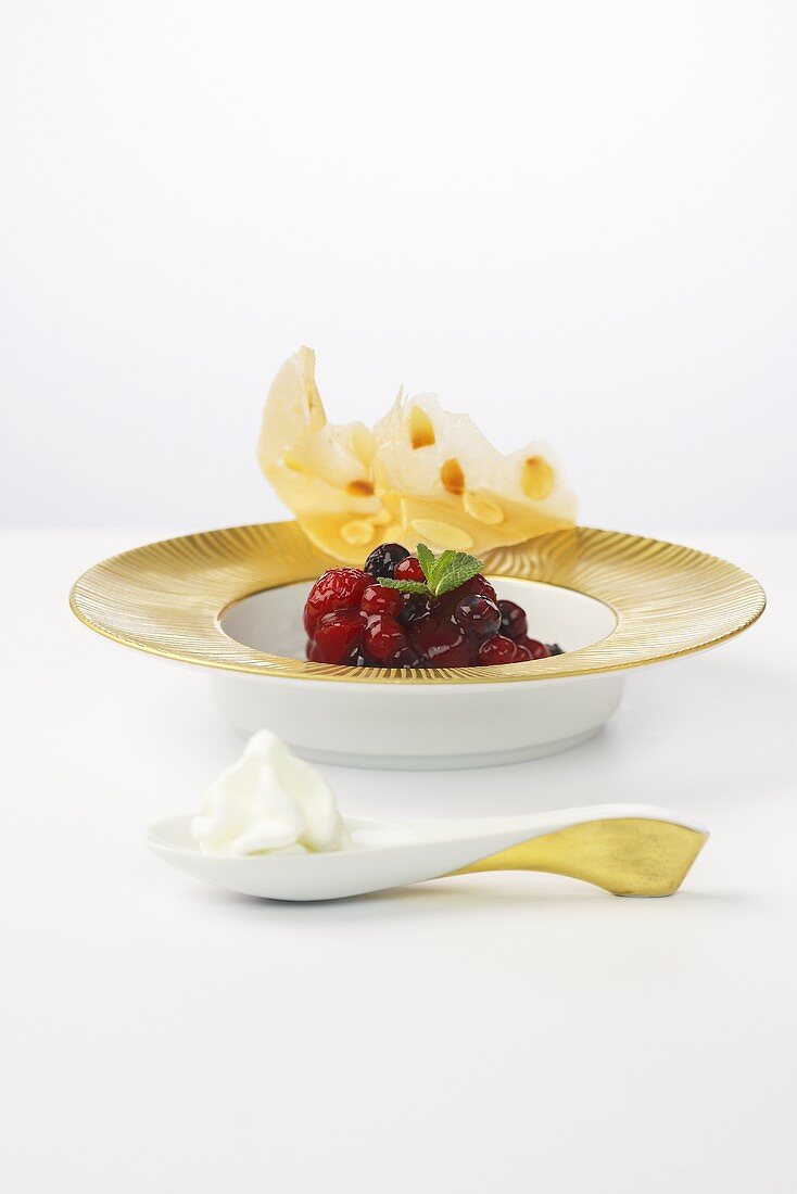 Rote Grütze (red berry jelly) with mascarpone foam and almond brittle
