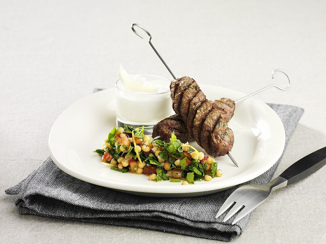 Reindeer kebab with a side salad