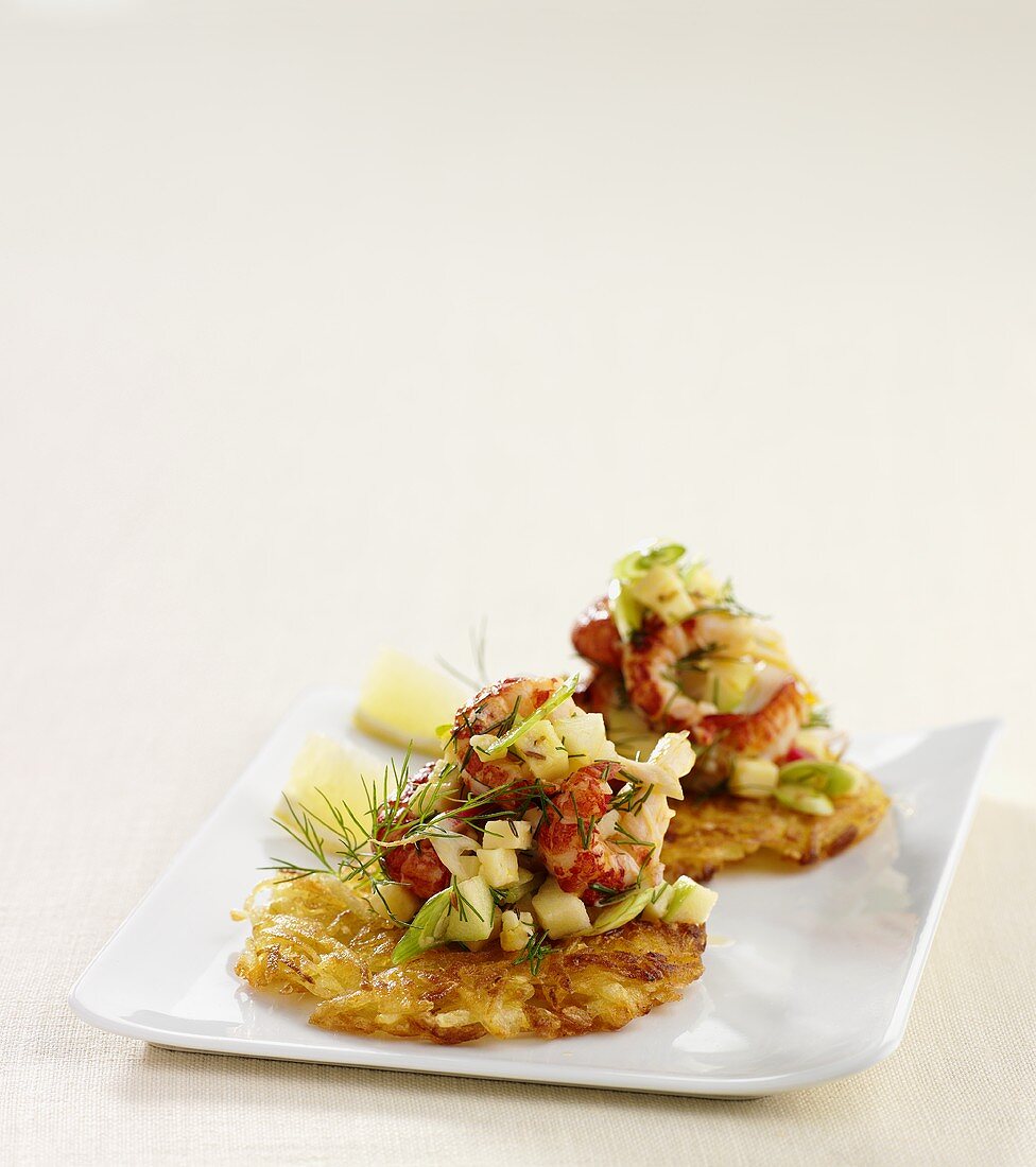 Potato cakes with crayfish salad