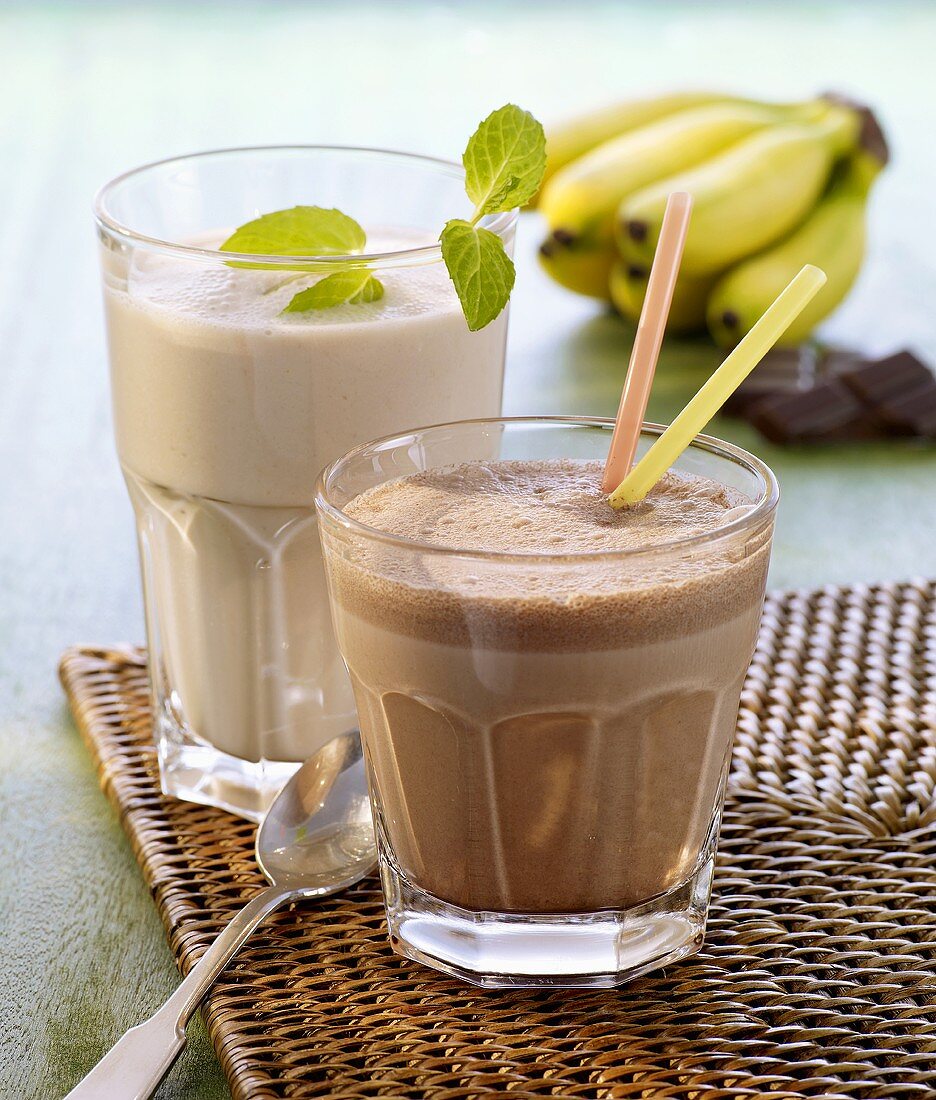 Chocolate shake with straws and a banana shake