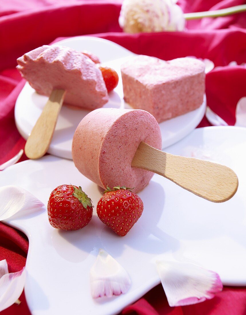 Home-made strawberry ice lollies
