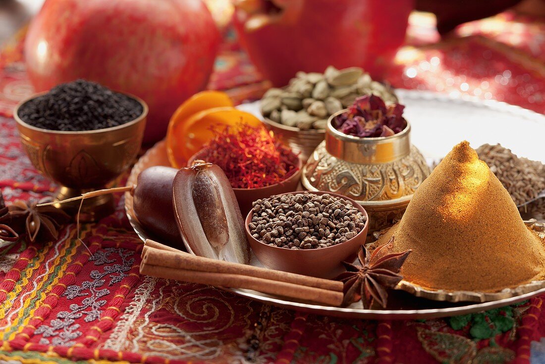 An arrangement of spices with pomegranates (Arabia)