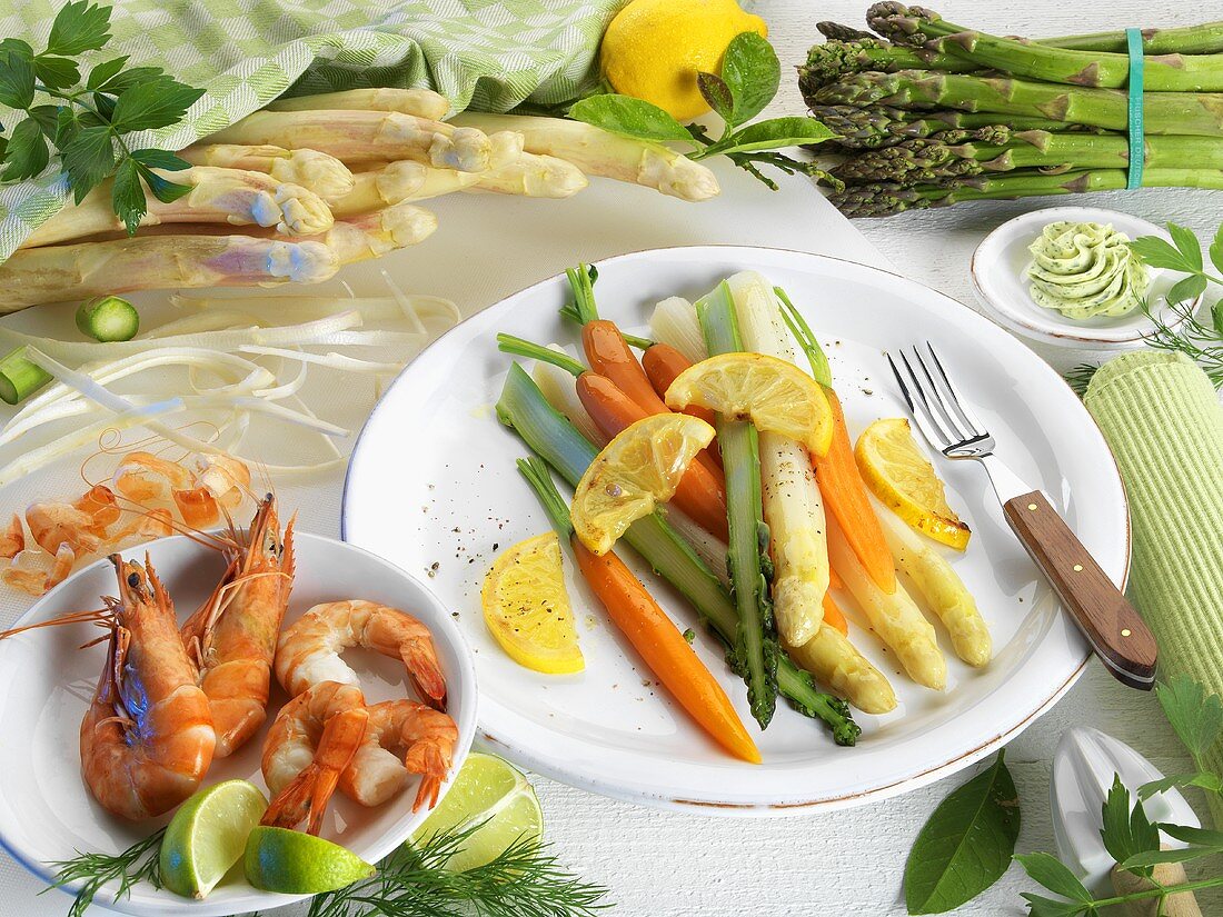 Asparagus with carrots and lemons, king prawns with limes