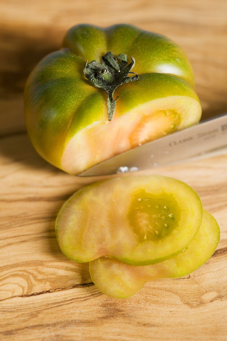 A sliced green tomato