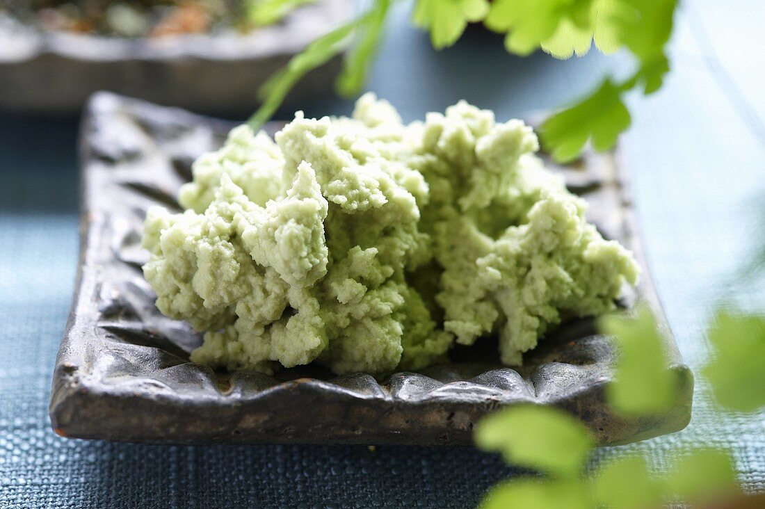 A bowl of fresh wasabi paste