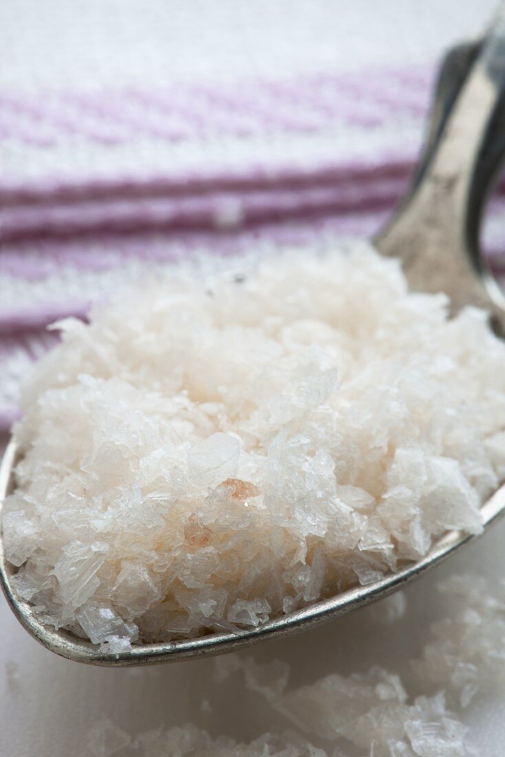 Pink 'Murray River' salt flakes on an old spoon