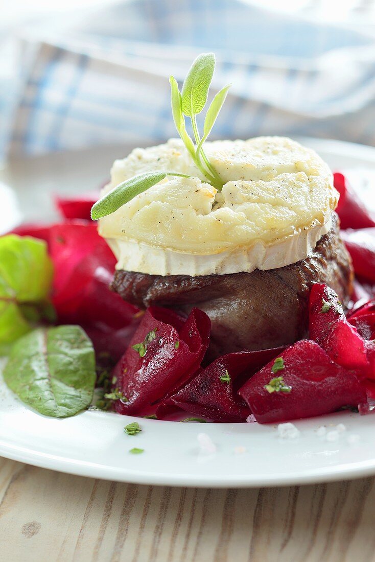 Beef steak with goat's cheese and beetroot salad