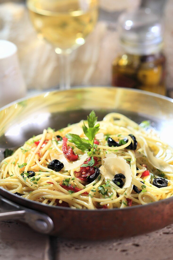Linguine alla puttanesca with sardines and olives