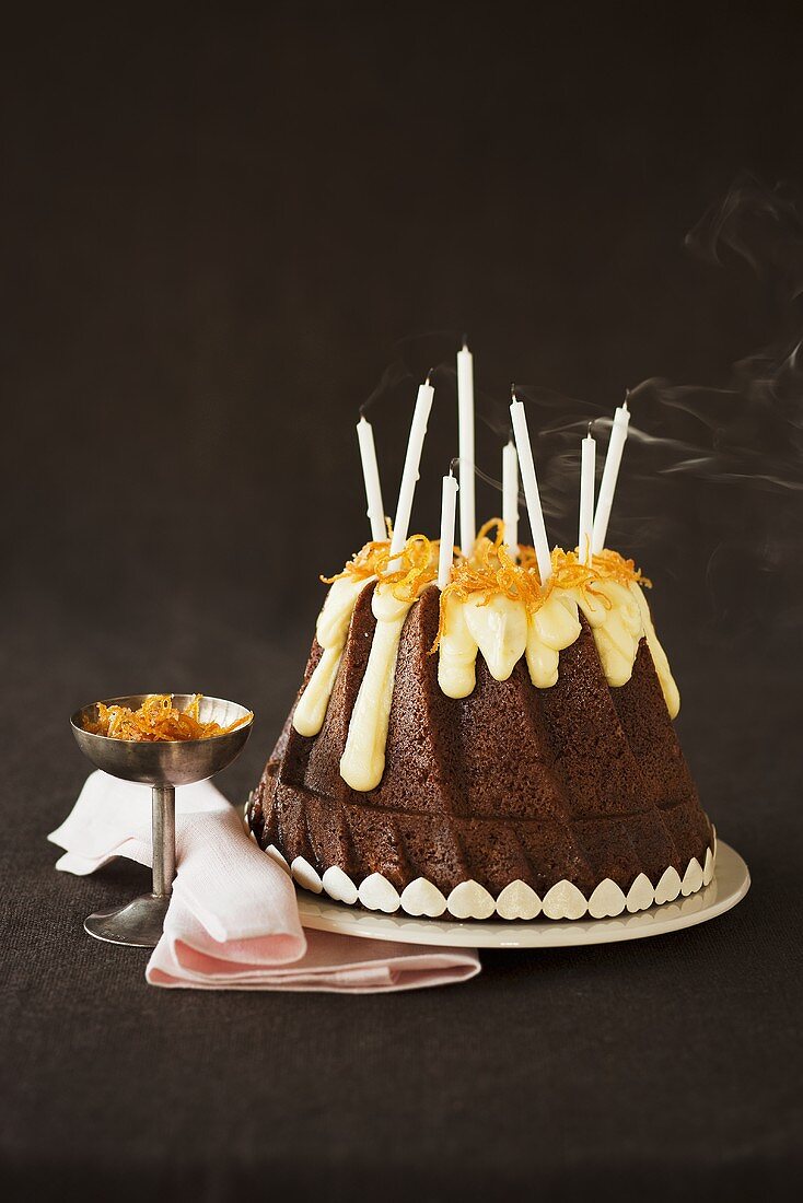 Chocolate Bundt cake with blown-out candles