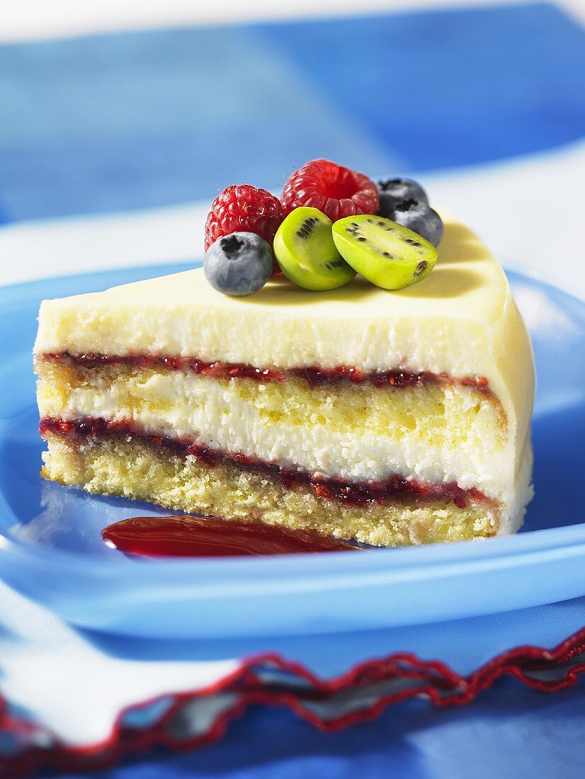 A slice of white chocolate and raspberry cheesecake