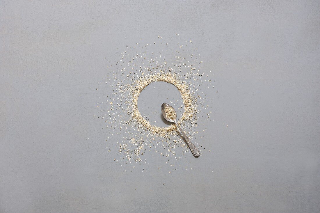 Oat bran on a spoon and in a circle