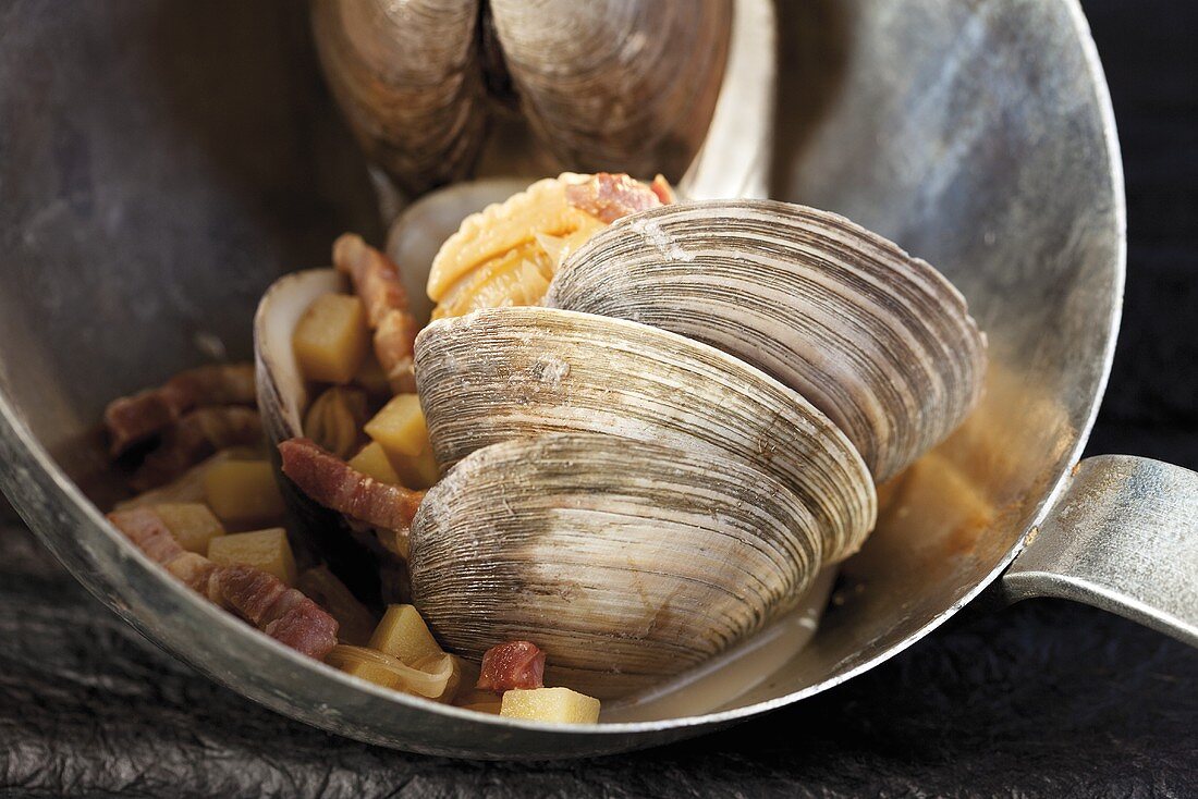 Mussel soup on a ladle