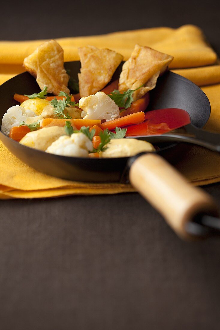 Vegetable curry with cheese biscuits