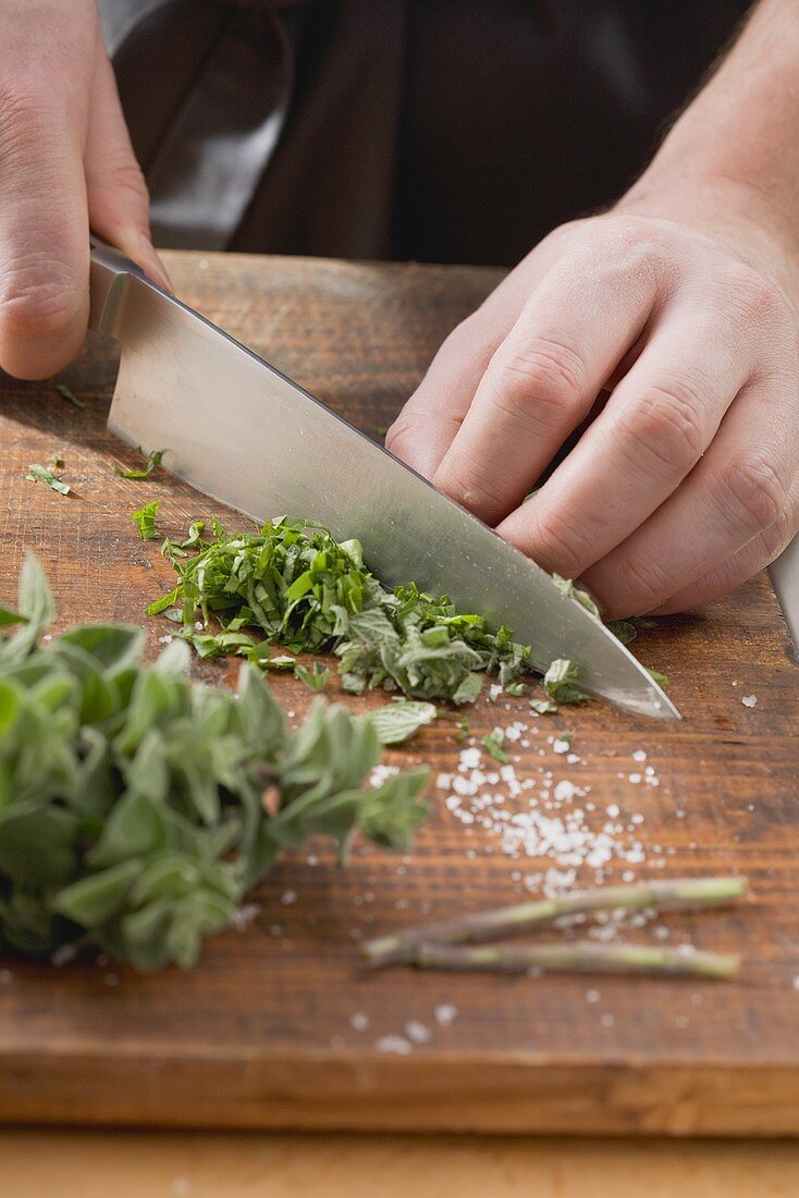 Herbs being chopped