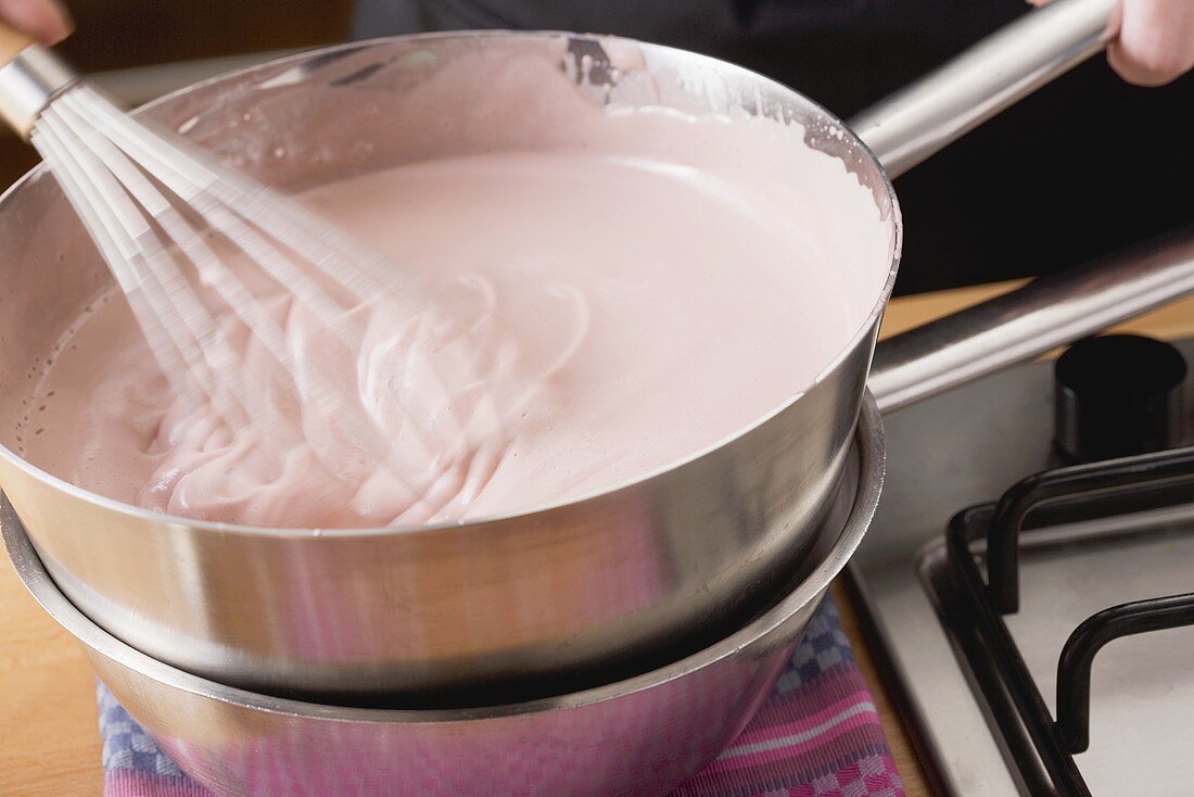 Zabaione being beaten in a bain marie