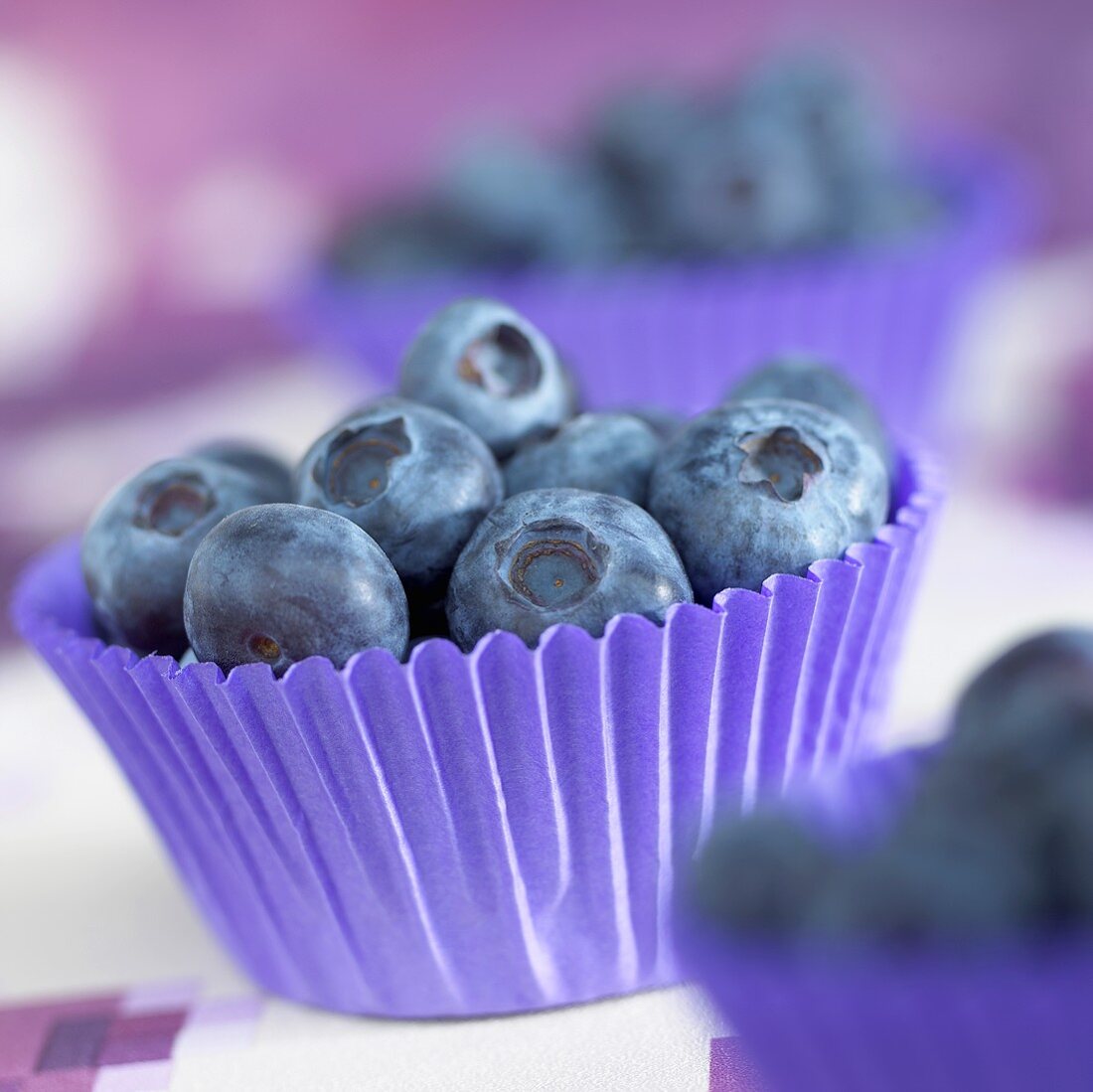 Blue berries in muffin cups