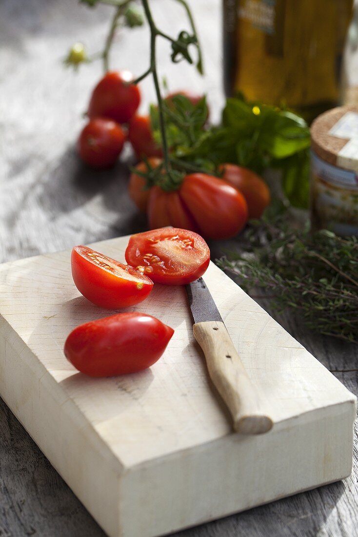Sliced tomatoes on a cutting board