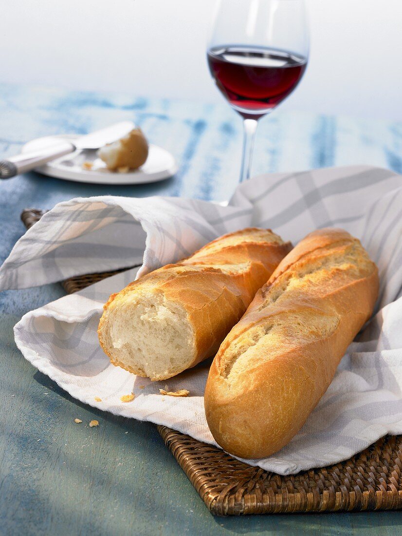 Baguette with a glass of red wine