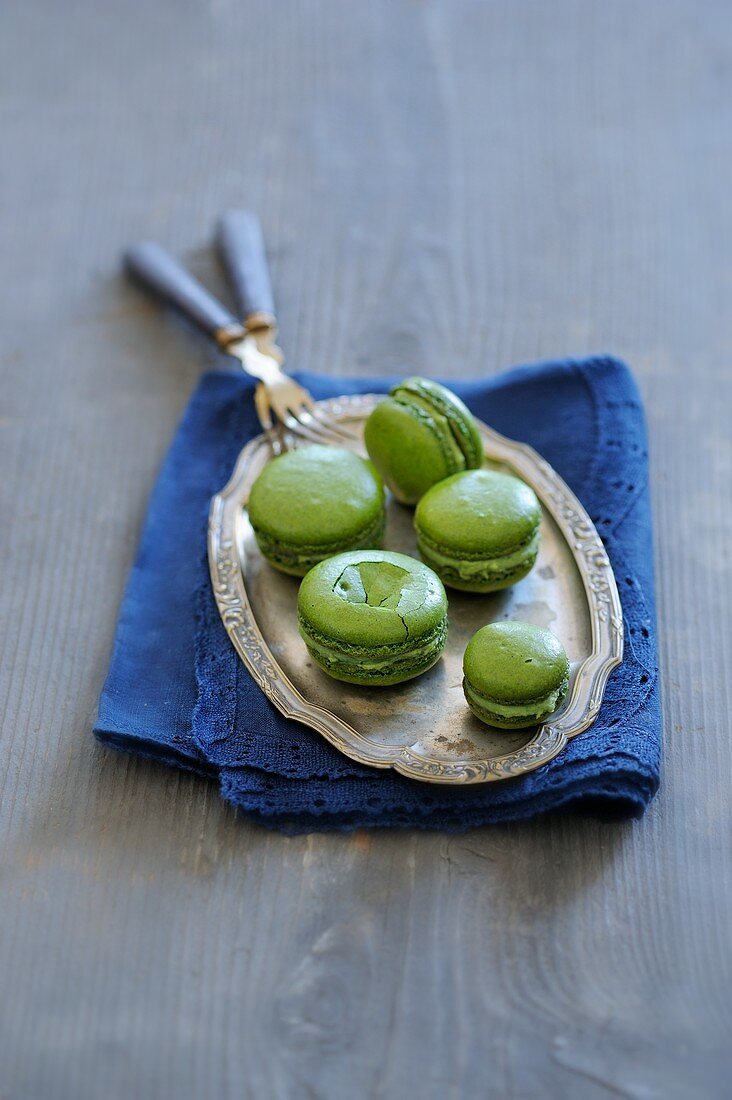 Pistachio macaroons on a silver tray