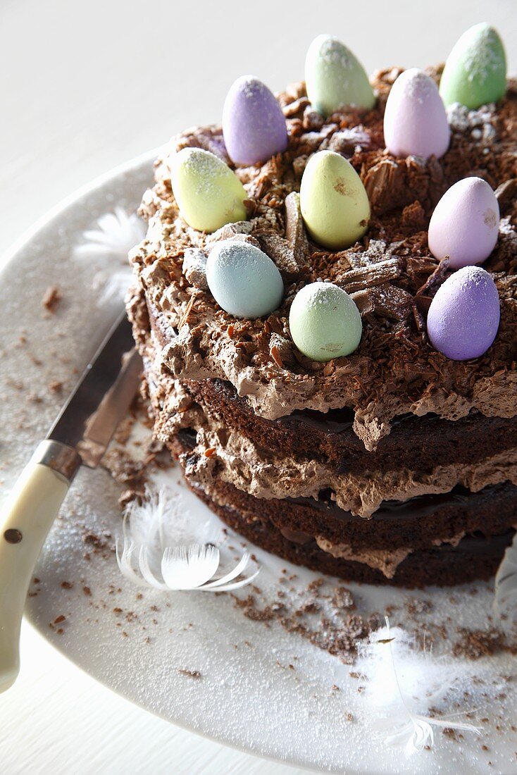 Chocolate cake with chocolate candy eggs at Easter