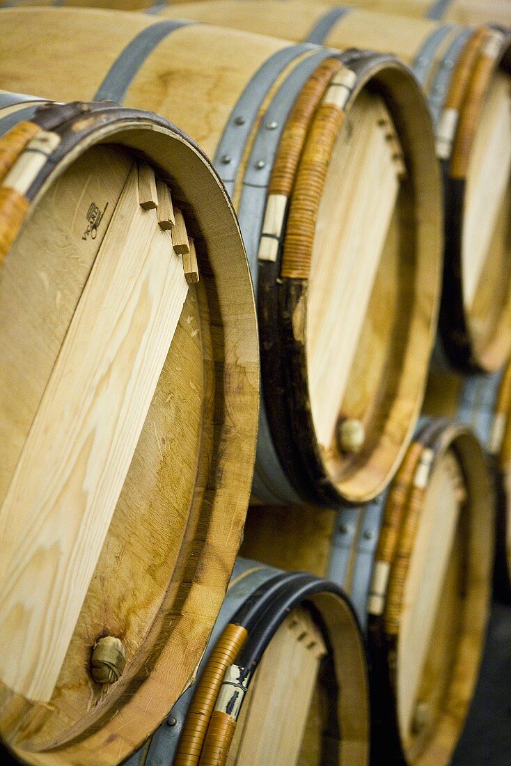 Wine aging in wooden barrels (Chateau Lynch-Bages Winery, France)