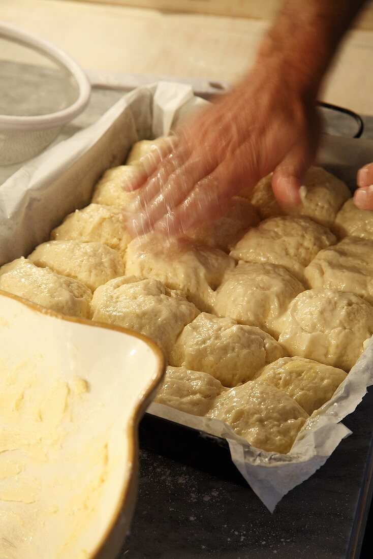 Preparing rusks (tea cakes, South Africa)