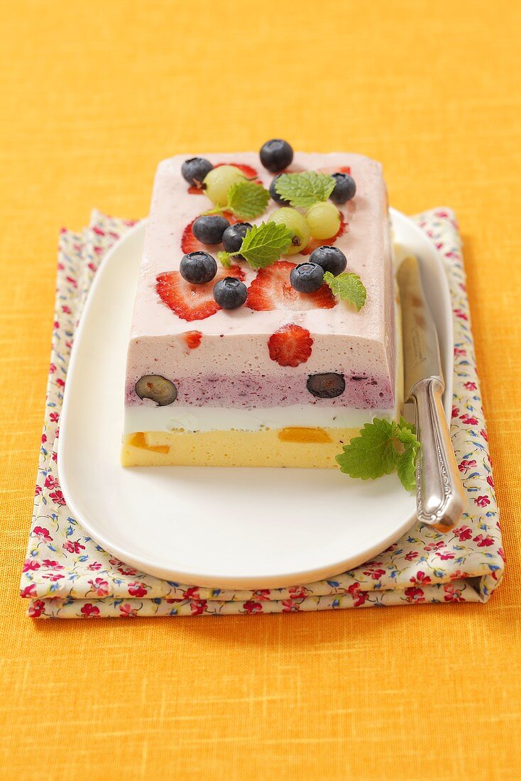 Easter terrine with blueberries, gooseberries, peaches and strawberries