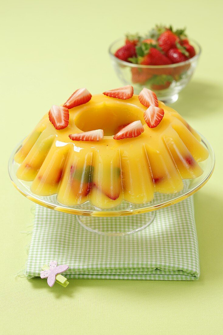 Orange jelly with strawberries