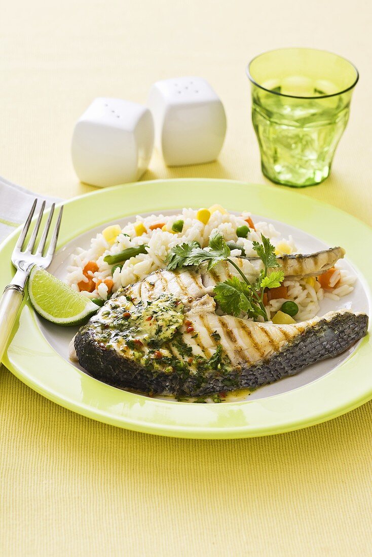Fish steaks with coriander and vegetable rice