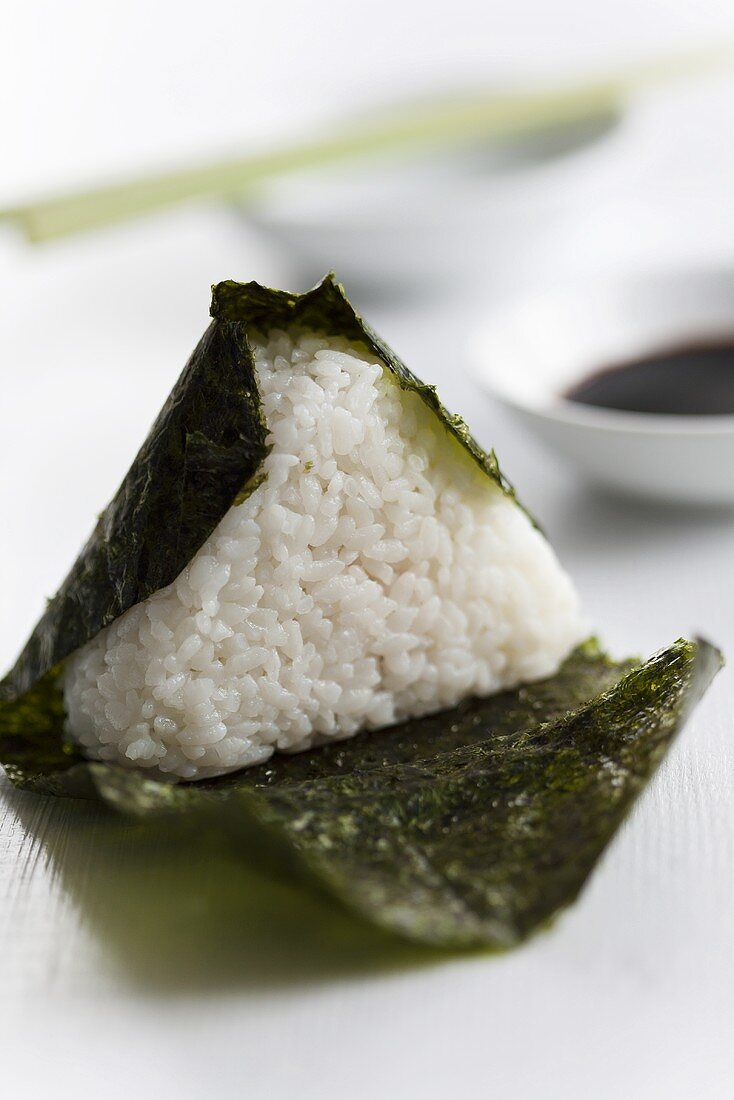 Onigiri (rice canape in a nori leaf filled with salmon, Japan)