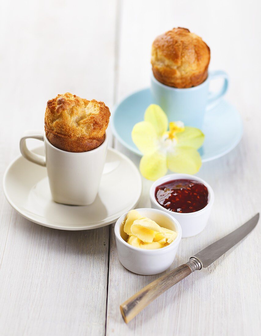 Popovers (American breakfast pastries) with butter and jam