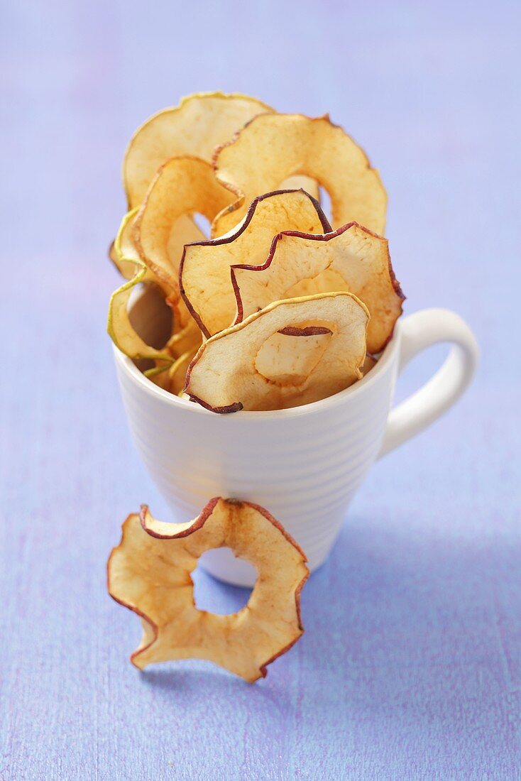 A cup of organic apple chips