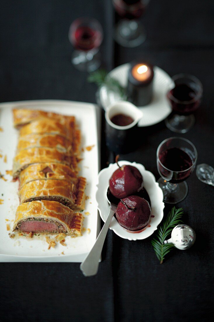 Venison Fillet Wellington with red wine pears