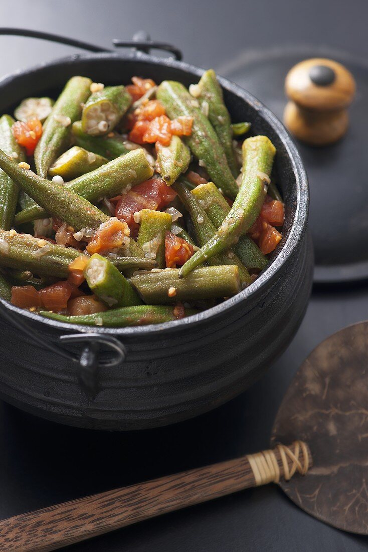 Okra pods with tomatoes (Brazil)