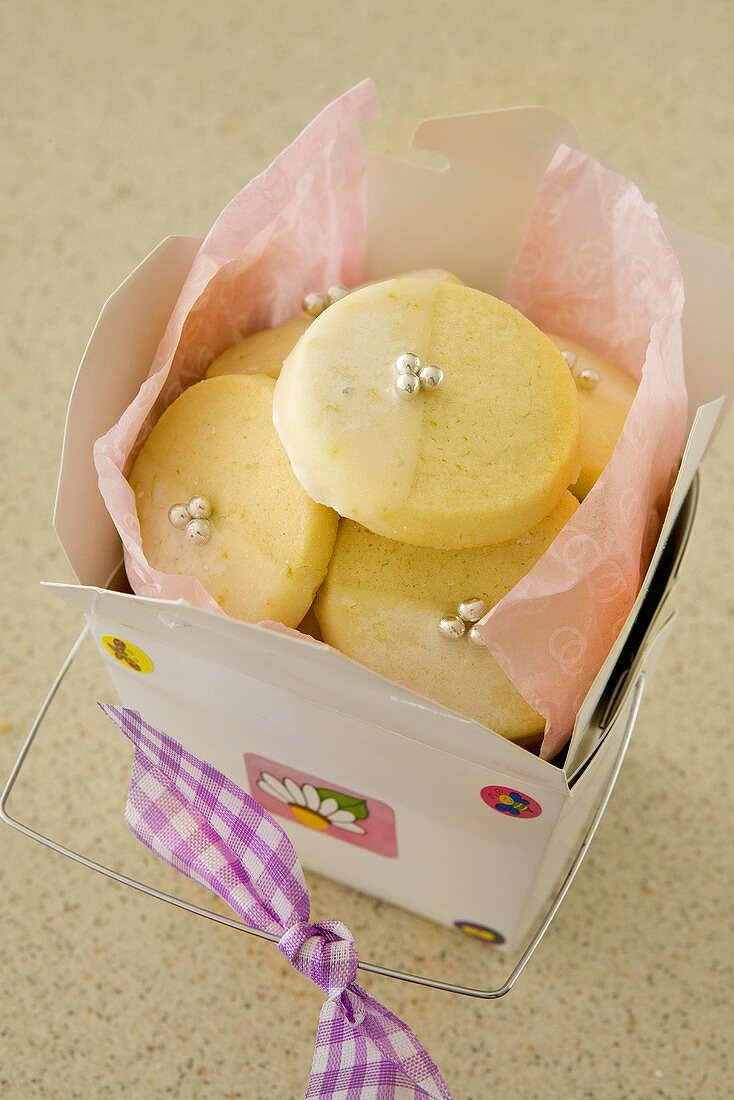 Lemon biscuits with silver balls as a gift