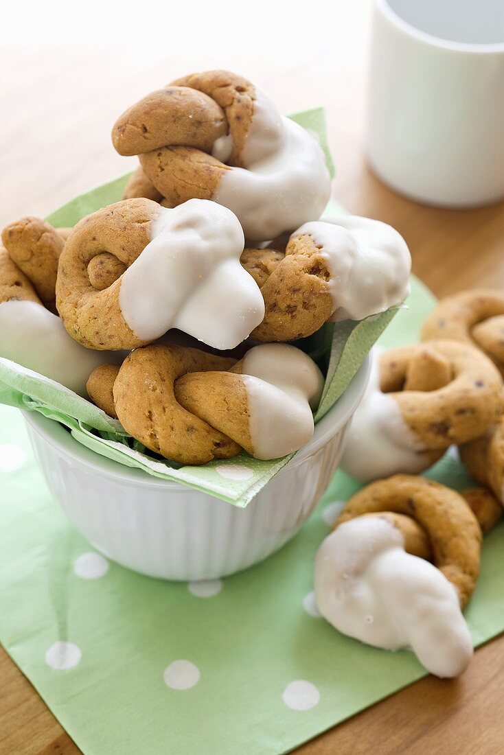 Chocolate and apricot pretzels with icing sugar