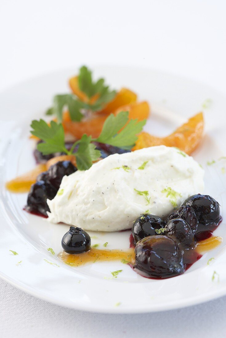 Vanilla foam with candied dates and oranges