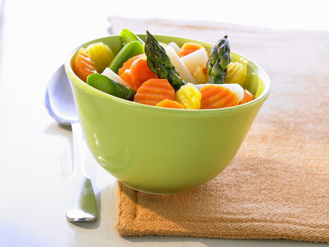 Mixed vegetables in a green bowl