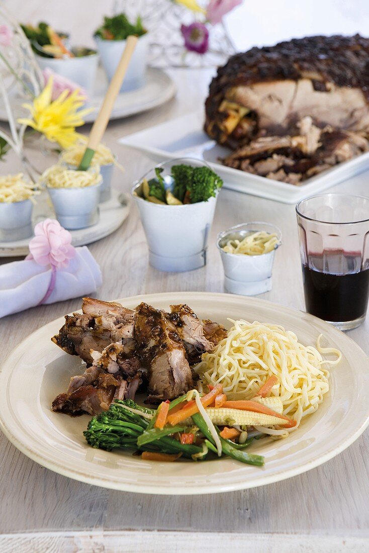 Oriental roast pork with vegetables and noodles
